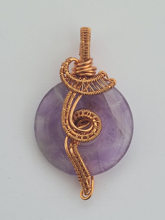 Pendentif donut en améthyste